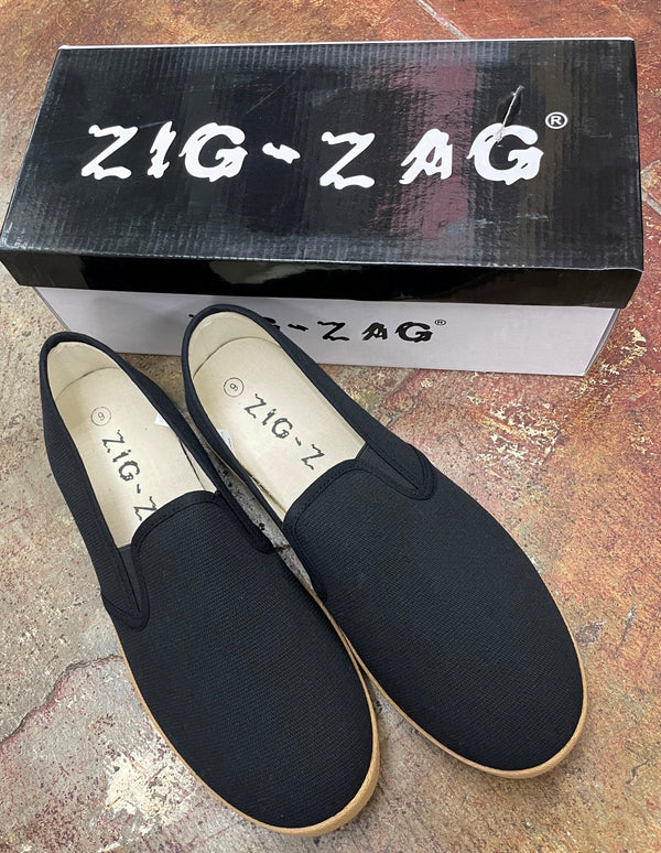ZIG ZAG Winos  Black with Tan Sole Slip-on.